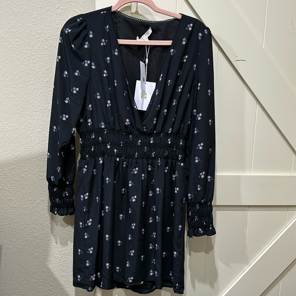 NWT WAYF navy floral dress with elastic waist and cuffs. From Bloomingdale’s.